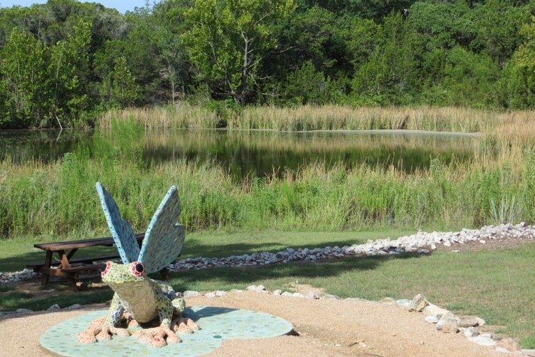 Bee Cave Sculpture of a frog with dragonfly wings